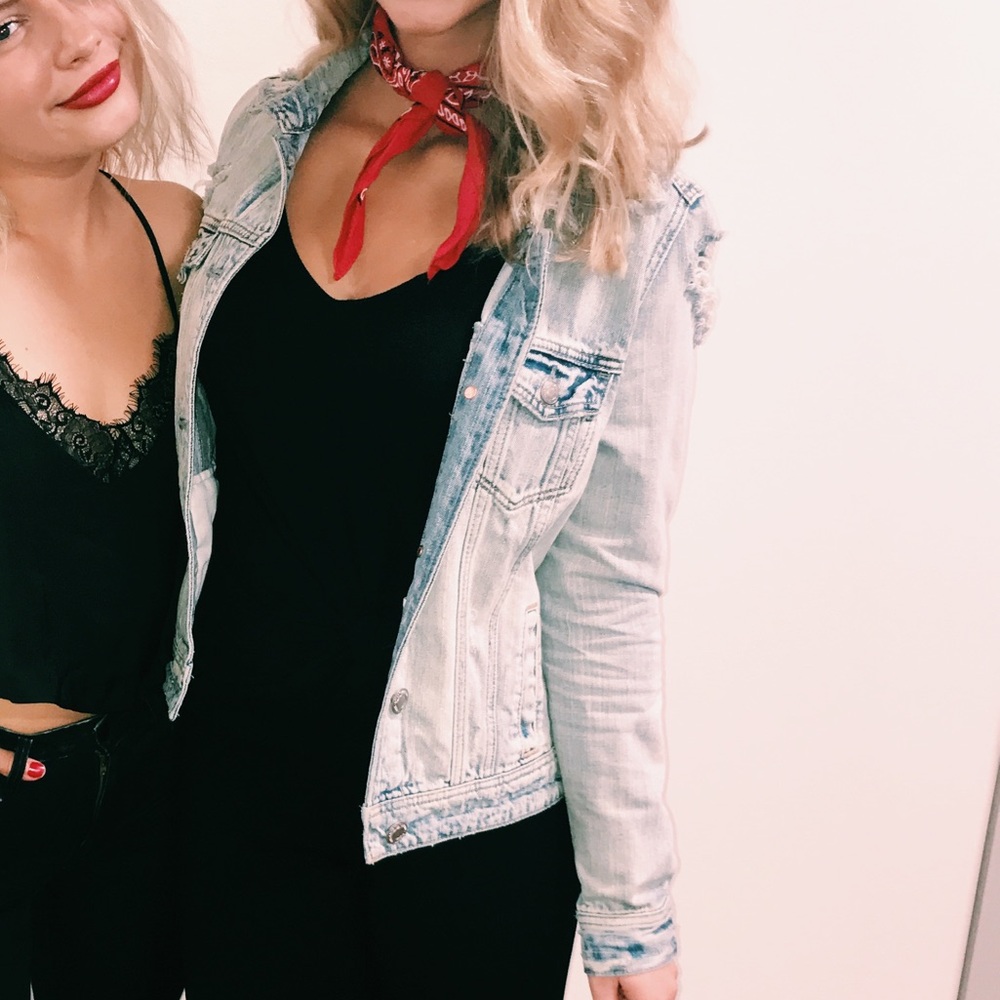 Distressed light wash denim jacket